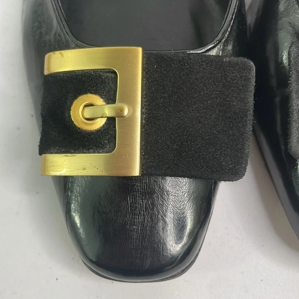 Vaneli black eel skin? Pumps w rounded square toe. Suede and gold buckle detail.